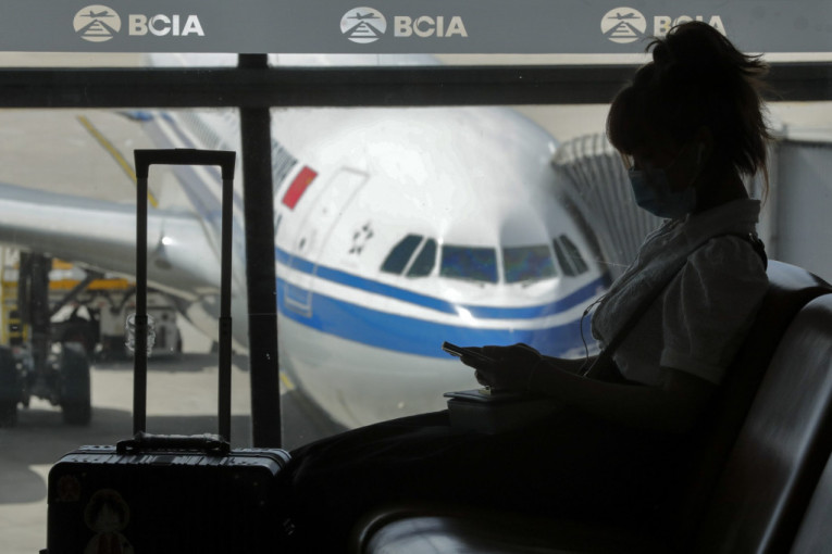 Prvi put od januara: Avion sleteo u Vuhan, putnici moraju da pokažu negativan PCR test