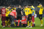 Stravičan sudar u kom je stao fudbal: Igrači Bajerna i Borusije u panici dozivali pomoć, dok je Brant nepomično ležao! (VIDEO)