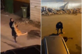 Žena išla ulicom, sa lavom u rukama, kao da je to nešto potpuno uobičajeno (VIDEO)