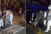 "Želim da umrem": Očajni stranac nije mogao da izdrži lokdaun u Šangaju, redari u zaštitnim odelima ga jedva savladali (VIDEO)