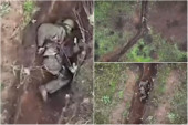 Na ruskog vojnika padaju bombe, a on ih samo baca što dalje od sebe: Neverovatan snimak iz Ukrajine (VIDEO)