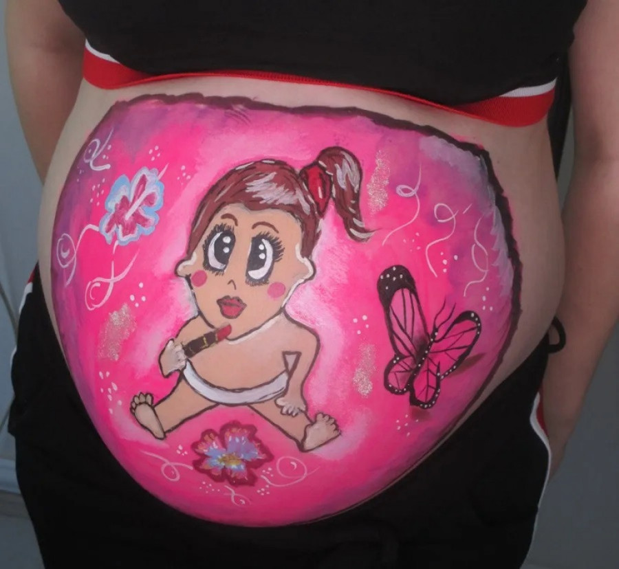 Najlepša šarena uspomena iz trudničkih dana: Dok Nataša oslikava motive na maminom stomaku beba se pomera (FOTO)