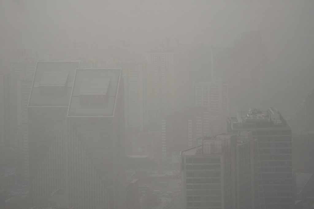 Peščana oluja pogodila Peking četvrti put za mesec dana (FOTO)