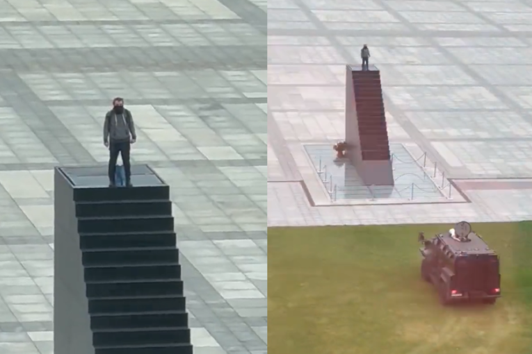 Drama u Poljskoj! Čovek se popeo na spomenik, pa pretio da će se razneti bombom (VIDEO/FOTO)