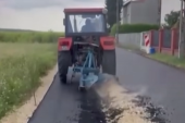 Seo u traktor i preorao 200 metara svežeg asfalta! Napravio štetu od 93.000 evra - a policiji dao neverovatno objašnjenje